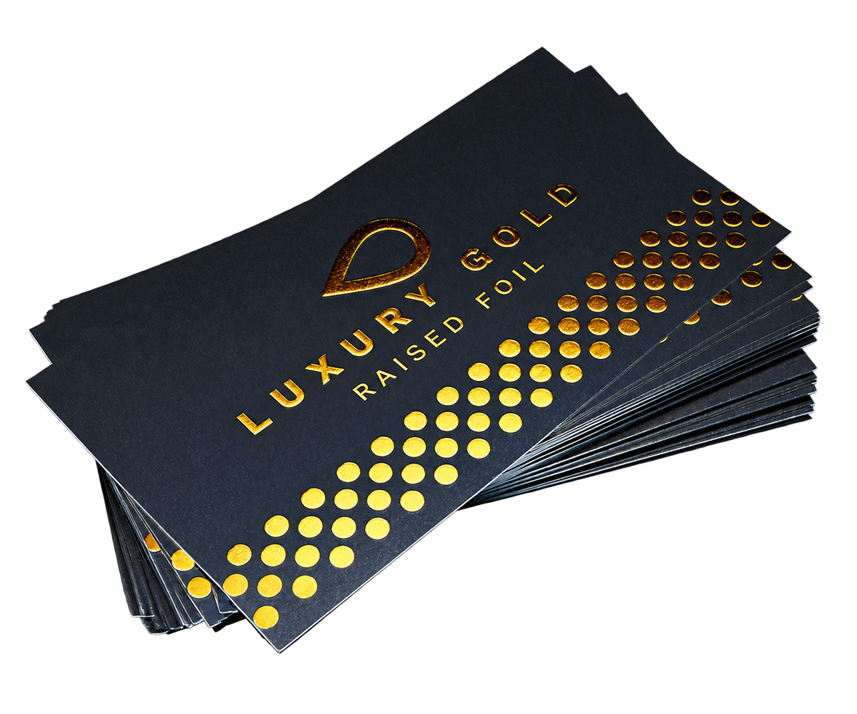 Dark business cards with raised metallic gold foil lettering and dots